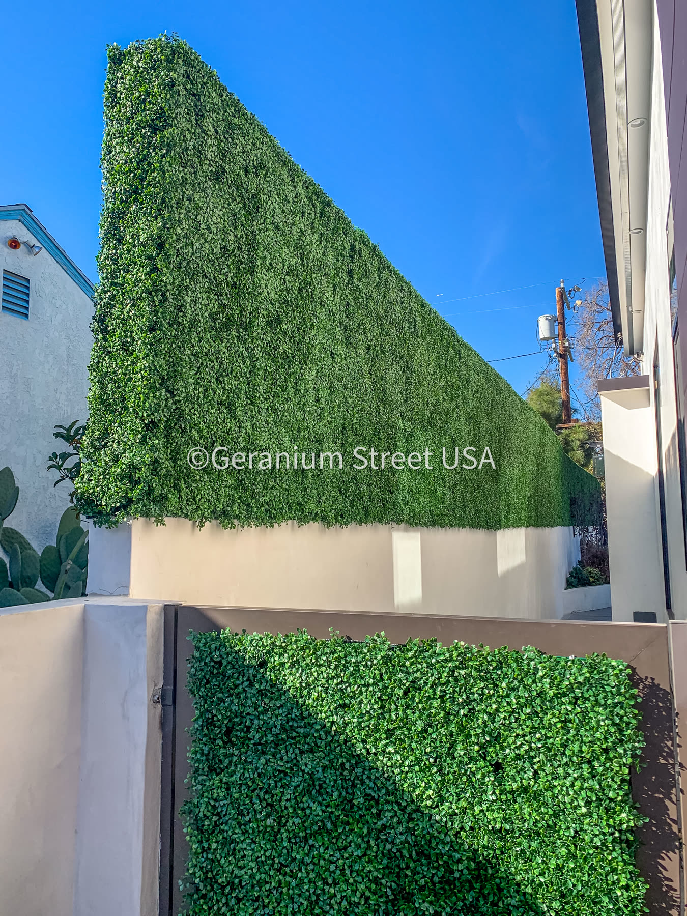Fence extension with faux hedge for residential privacy